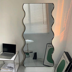 Wavy black frame mirror