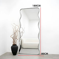Wavy black frame mirror