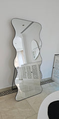 Wavy black frame mirror