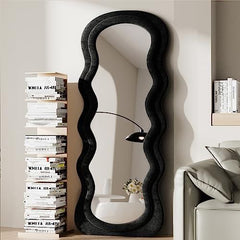 Wavy black velvet wall mirror