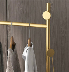 Clothes rack with oval mirror